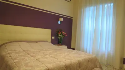 Letto o letti in una camera di L'ulivo Chiantigiana 115