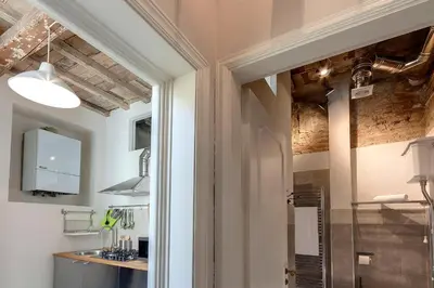Cucina o angolo cottura di GM Apartment by Mamo Florence