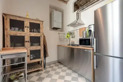 Cucina o angolo cottura di GM Apartment by Mamo Florence