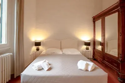 Letto o letti in una camera di Rondinelli Charme Prestige