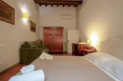 Letto o letti in una camera di Rondinelli Charme Prestige