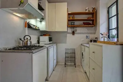 Cucina o angolo cottura di Il Tulipano Apartment With Patio