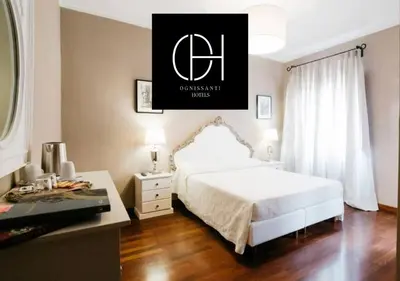 Letto o letti in una camera di Residenza Ognissanti
