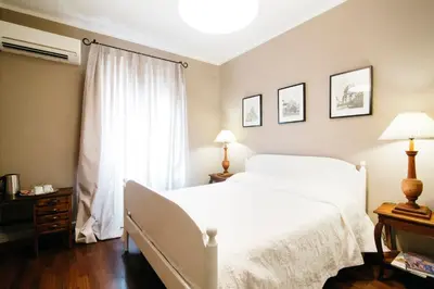 Letto o letti in una camera di Residenza Ognissanti