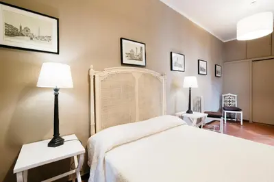 Letto o letti in una camera di Residenza Ognissanti