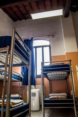 Letto o letti in una camera di Hostel Santa Monaca