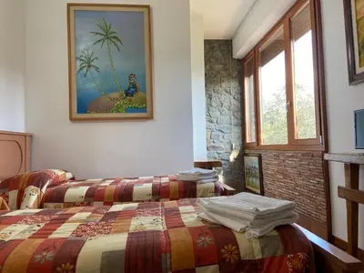 Letto o letti in una camera di Villa Gallorosso