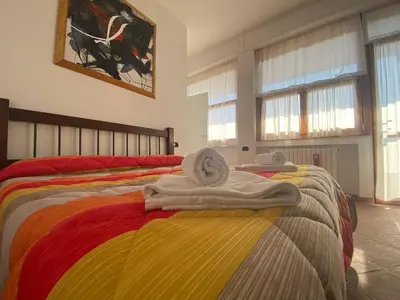 Letto o letti in una camera di Villa Gallorosso