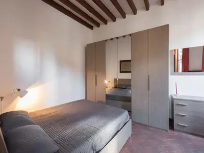 Letto o letti in una camera di Il Quartierino d'Oltrarno