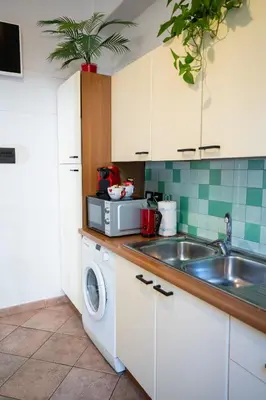 Cucina o angolo cottura di Santa Croce Garden Apartment
