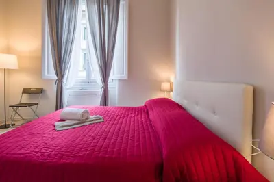 Letto o letti in una camera di Beccaria Suite