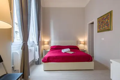 Letto o letti in una camera di Beccaria Suite