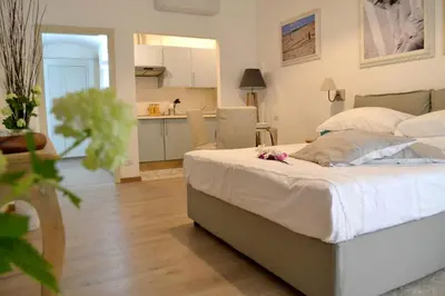 Letto o letti in una camera di Piccolo Borgo Antico