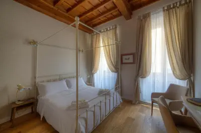 Letto o letti in una camera di Assaporarte