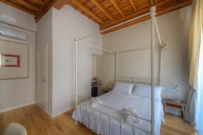 Letto o letti in una camera di Assaporarte