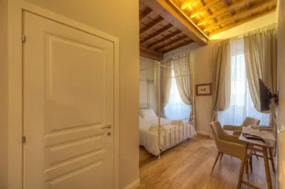 Letto o letti in una camera di Assaporarte