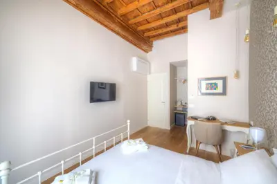 Letto o letti in una camera di Assaporarte