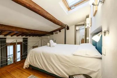 Letto o letti in una camera di Loft Duomo Cathedral with Lift