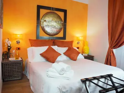 Letto o letti in una camera di Residenza 54