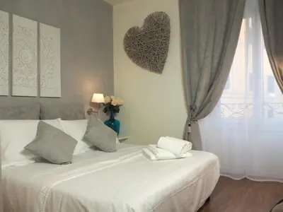 Letto o letti in una camera di Residenza 54
