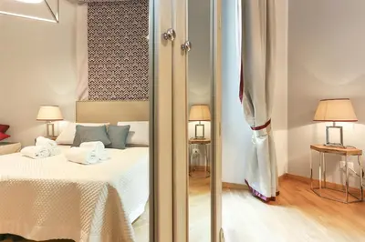 Letto o letti in una camera di Tornabuoni Boutique