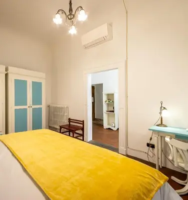 Letto o letti in una camera di La Residenza del Proconsolo