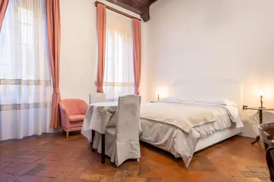 Letto o letti in una camera di La Residenza del Proconsolo