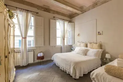 Letto o letti in una camera di Casa Laura&Duccio