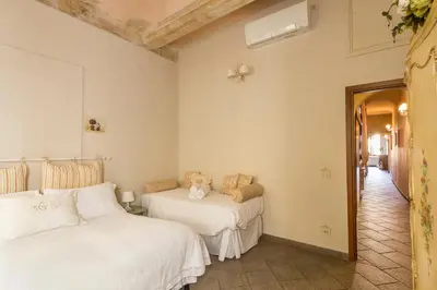 Letto o letti in una camera di Casa Laura&Duccio