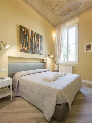Letto o letti in una camera di Cosy Fiesolana
