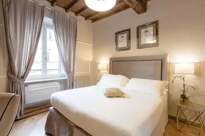Letto o letti in una camera di Relais Tosinghi