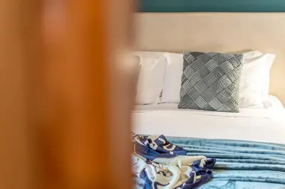 Letto o letti in una camera di San Lorenzo Five Senses
