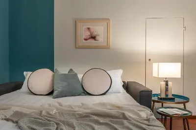 Letto o letti in una camera di San Lorenzo Five Senses