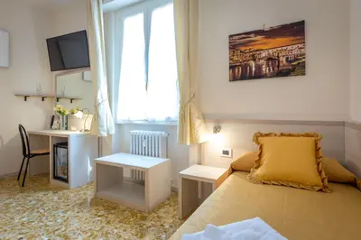 Letto o letti in una camera di B&B Dolce Luna