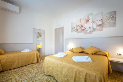 Letto o letti in una camera di B&B Dolce Luna