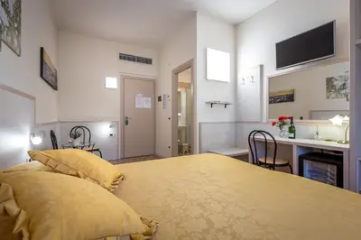Letto o letti in una camera di B&B Dolce Luna