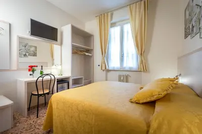 Letto o letti in una camera di B&B Dolce Luna