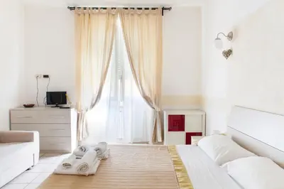 Letto o letti in una camera di Affittacamere San Jacopino