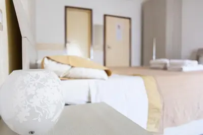 Letto o letti in una camera di Affittacamere San Jacopino
