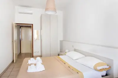 Letto o letti in una camera di Affittacamere San Jacopino