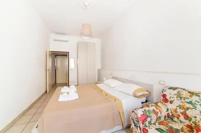Letto o letti in una camera di Affittacamere San Jacopino