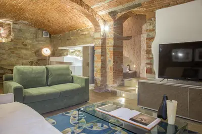 TV o dispositivi per l'intrattenimento presso Giglio Apartments by Mmega