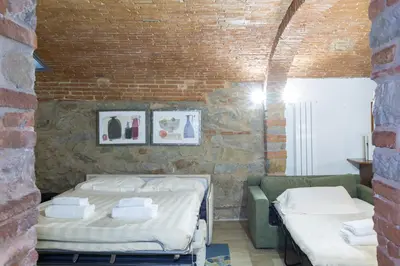 Letto o letti in una camera di Giglio Apartments by Mmega