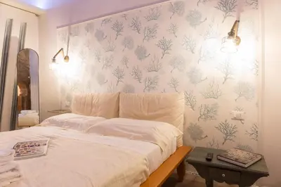 Letto o letti in una camera di Giglio Apartments by Mmega