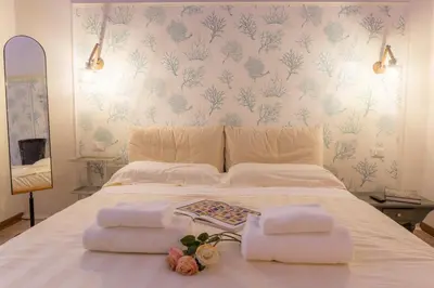Letto o letti in una camera di Giglio Apartments by Mmega