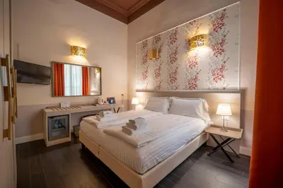 Letto o letti in una camera di B&B Repubblica