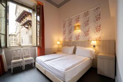 Letto o letti in una camera di B&B Repubblica