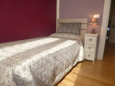 Letto o letti in una camera di Sunflower Santa Maria Novella