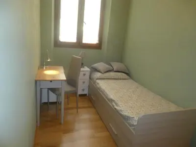 Letto o letti in una camera di Sunflower Santa Maria Novella