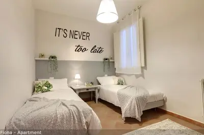 Letto o letti in una camera di Fiesolana Apartments by Mamo Florence